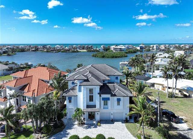 Property at 26823 Mclaughlin Blvd, Bonita Springs, FL 34134, 5 beds, 5.5 baths