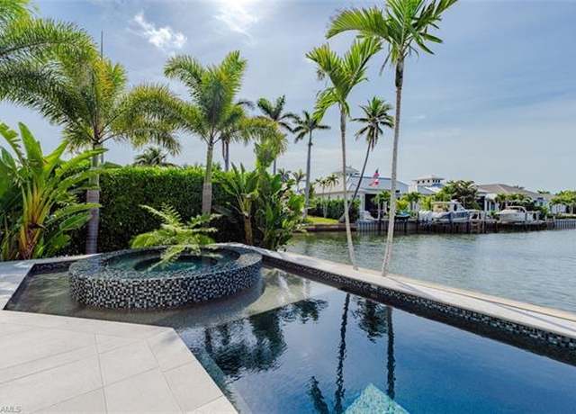 Property at 1266 Cobia Ct, Naples, FL 34102, 4 beds, 5.5 baths