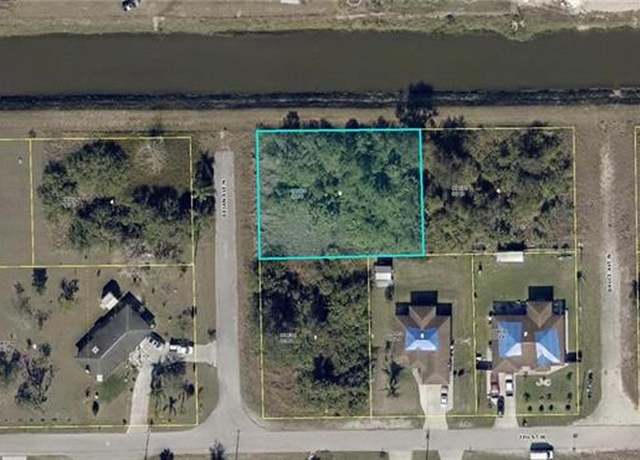 Property at 704 Brian Ave N, Lehigh Acres, FL 33971
