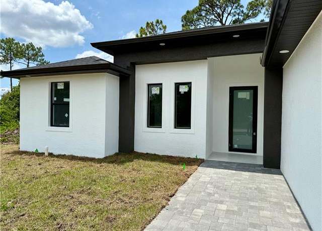 Property at 512 Genesee Ave S, Lehigh Acres, FL 33974, 3 beds, 2 baths