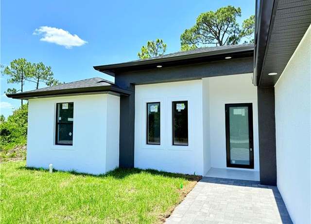 Property at 512 Genesee Ave S, Lehigh Acres, FL 33974, 3 beds, 2 baths
