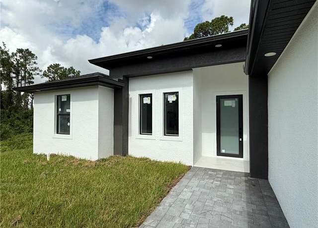 Property at 512 Genesee Ave S, Lehigh Acres, FL 33974, 3 beds, 2 baths