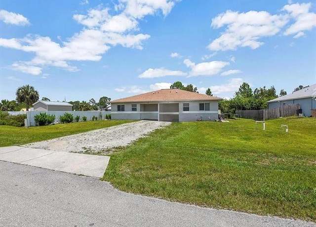 Property at 909-911 Jaguar Blvd, Lehigh Acres, FL 33974, 4 beds, 4 baths