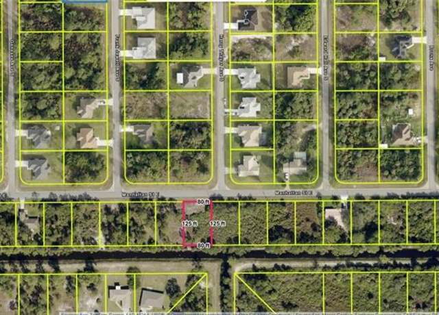 Property at 728 Manhattan St E, Lehigh Acres, FL 33974