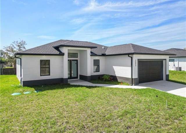 Property at 1207 E 15th St, Lehigh Acres, FL 33972, 3 beds, 2 baths