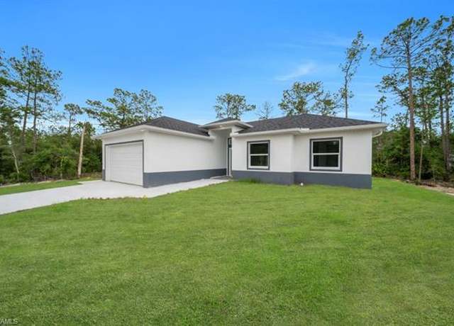 Property at 1205 W 14th St, Lehigh Acres, FL 33972, 3 beds, 2 baths