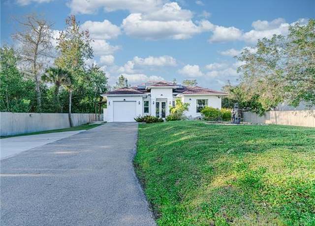 Property at 233 39th Ave NE, Naples, FL 34120, 4 beds, 3 baths