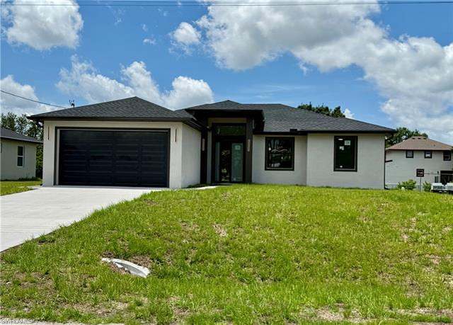 Property at 3311 5th St SW, Lehigh Acres, FL 33976, 3 beds, 2 baths