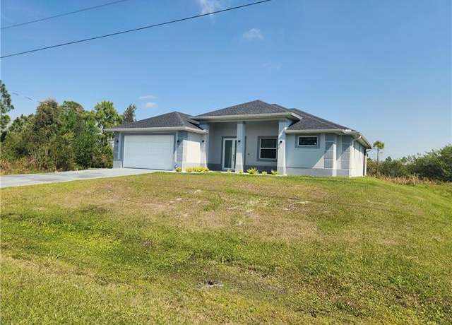 Property at 406 Muriel St, Lehigh Acres, FL 33972, 3 beds, 2 baths