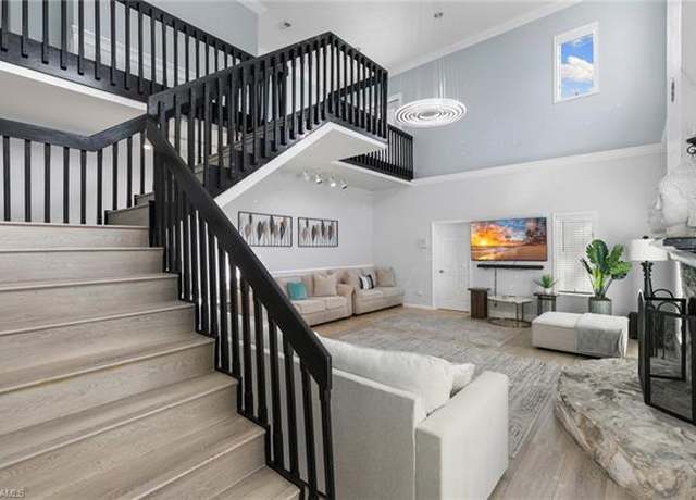 Property at 130 1st St NW, Naples, FL 34120, 5 beds, 4 baths