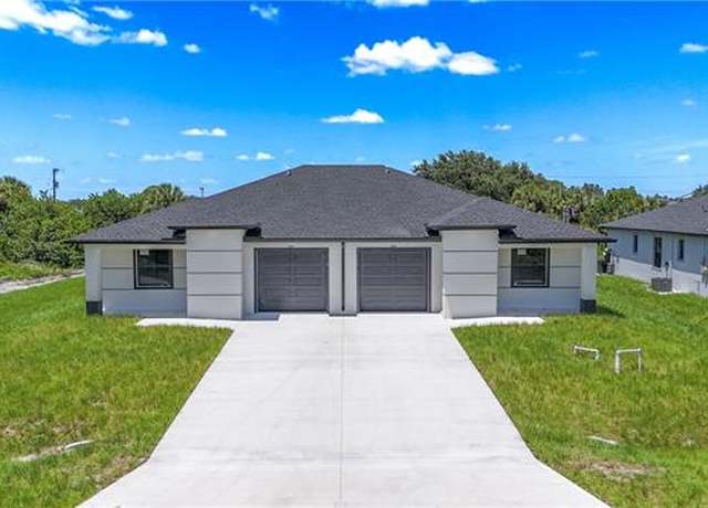Property at 843 Duplex St E, Lehigh Acres, FL 33974, 6 beds, 4 baths