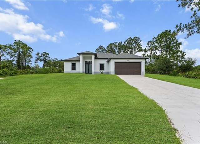 Property at 505 Wabasso Ave S, Lehigh Acres, FL 33974, 4 beds, 2 baths