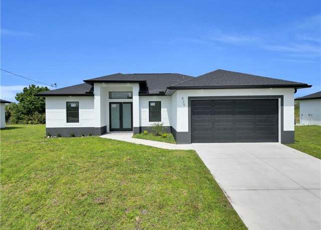 Property at 825 Frederick Reid St E, Lehigh Acres, FL 33974, 3 beds, 2 baths