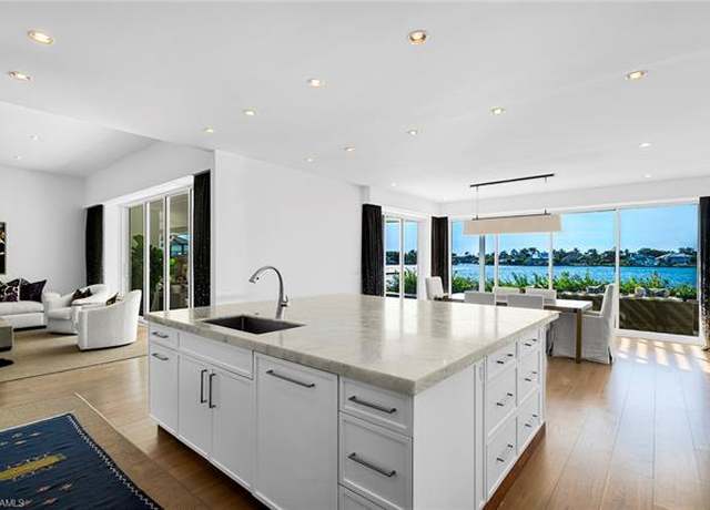 Property at 2160 Kingfish Rd, Naples, FL 34102, 4 beds, 3 baths