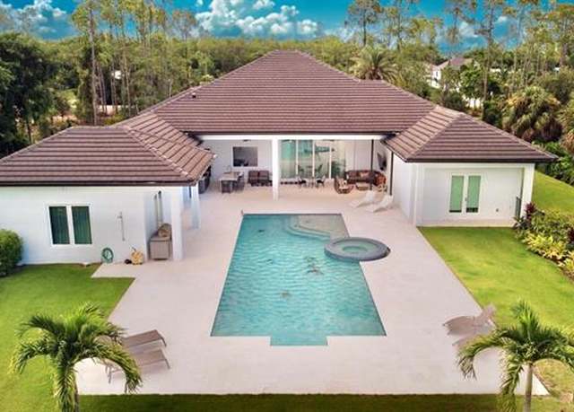 Property at 6688 Hunters Rd, Naples, FL 34109, 5 beds, 5.5 baths