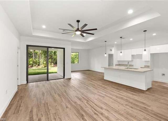 Property at 1205 E 7th St, Lehigh Acres, FL 33972, 3 beds, 2.5 baths