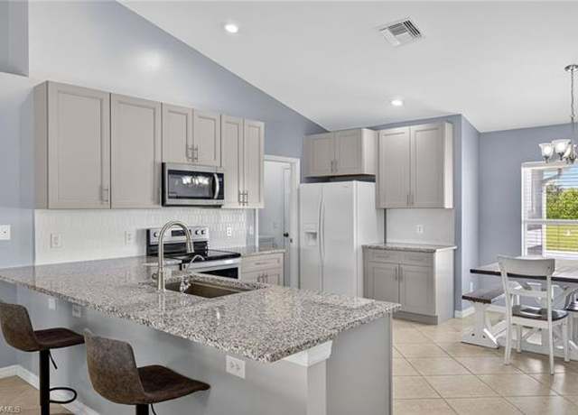 Property at 2525 NE 4th Pl, Cape Coral, FL 33909, 4 beds, 2 baths