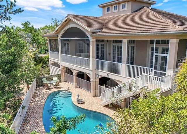 Property at 940 Sea Oats Ct, Marco Island, FL 34145, 3 beds, 3.5 baths