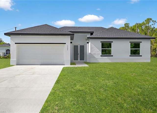 Property at 1204 E 11th St, Lehigh Acres, FL 33972, 4 beds, 2 baths