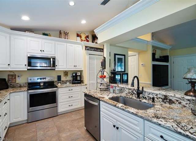 Property at 2421 22nd Ave NE, Naples, FL 34120, 3 beds, 2 baths