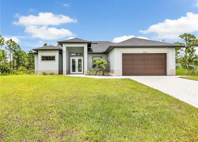 Property at 1604 W 9th St, Lehigh Acres, FL 33972, 3 beds, 2 baths