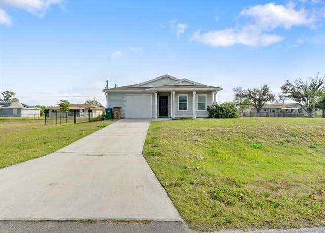 Property at 2201 NE 7th Ave, Cape Coral, FL 33909, 4 beds, 2 baths