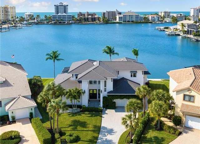 Property at 414 Palm Ct, Naples, FL 34108, 4 beds, 5.5 baths
