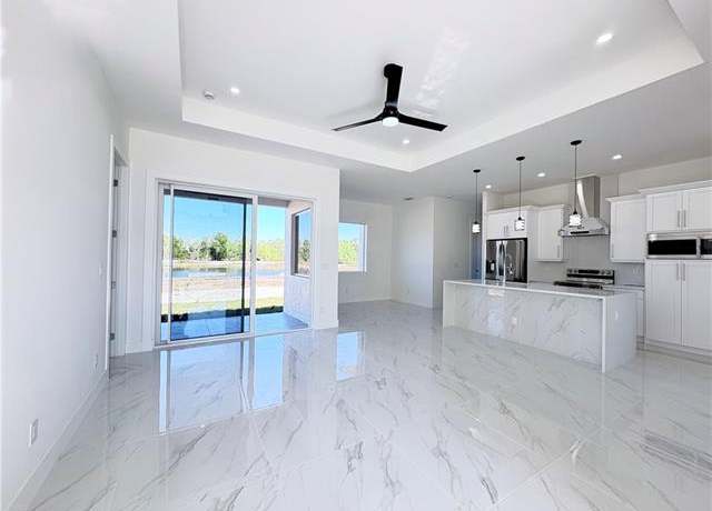Property at 423 Harshaw St, Lehigh Acres, FL 33974, 4 beds, 2 baths