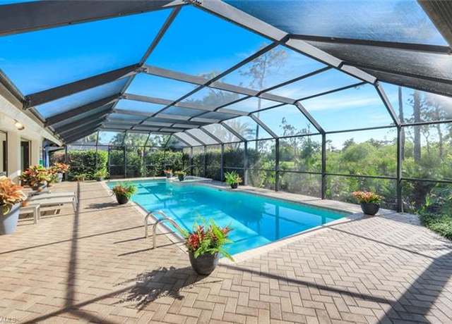 Property at 3953 Woodlake Dr, Bonita Springs, FL 34134, 3 beds, 4.5 baths