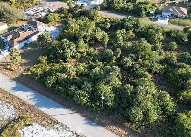 Property at 724 Cane St E, Lehigh Acres, FL 33974