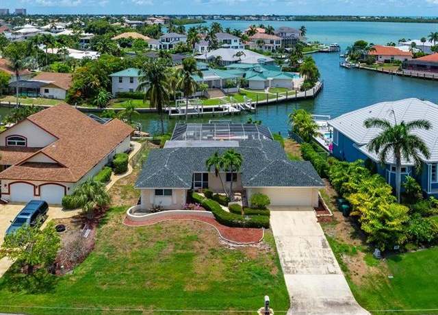 Property at 1104 Gayer Way, Marco Island, FL 34145, 3 beds, 2 baths