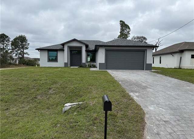 Property at 3104 Curtis Ave S, Lehigh Acres, FL 33976, 4 beds, 3 baths