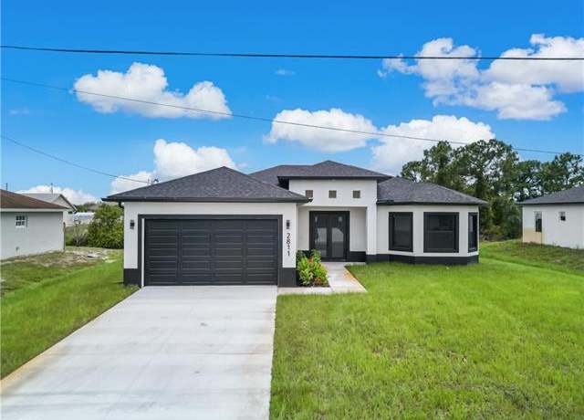 Property at 2811 27th St SW, Lehigh Acres, FL 33976, 3 beds, 2 baths