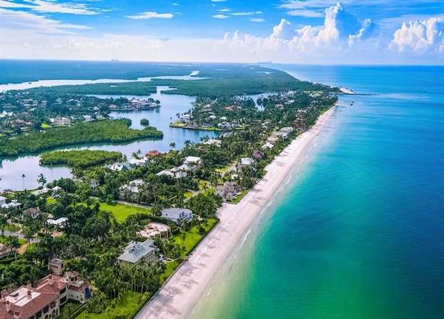 Property at 230 Champney Bay Ct, Naples, FL 34102, 4 beds, 3 baths