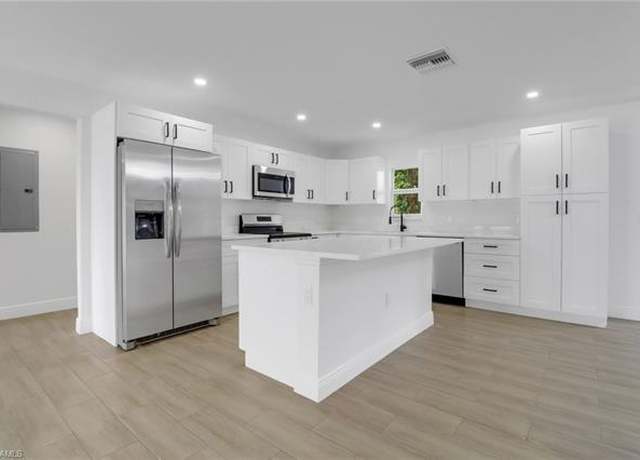 Property at 4448 18th Ave SW, Naples, FL 34116, 4 beds, 3 baths