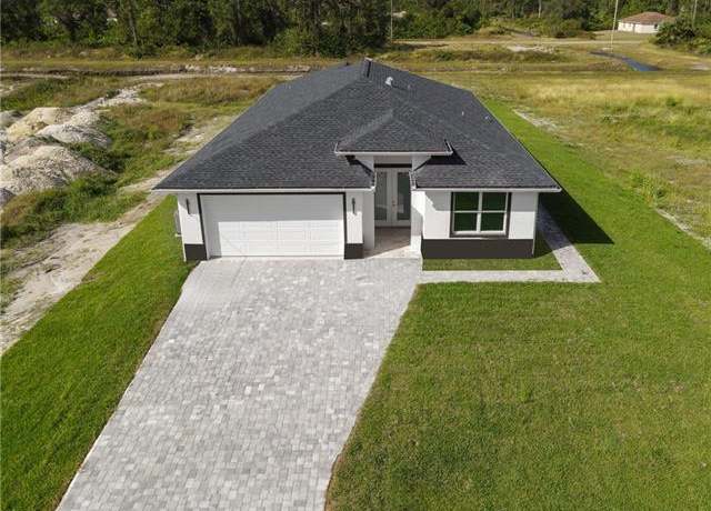 Property at 436 Genoa Ave S, Lehigh Acres, FL 33974, 3 beds, 2.5 baths