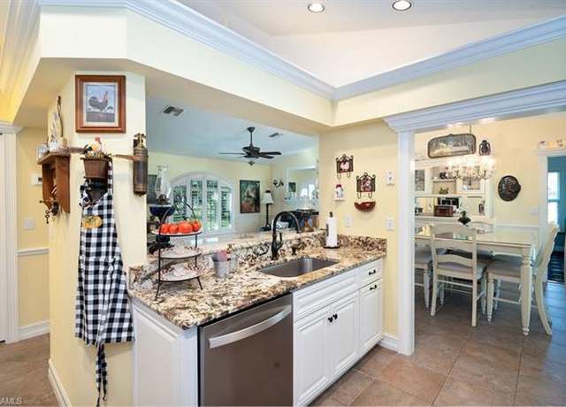 Property at 2421 22nd Ave NE, Naples, FL 34120, 3 beds, 2 baths