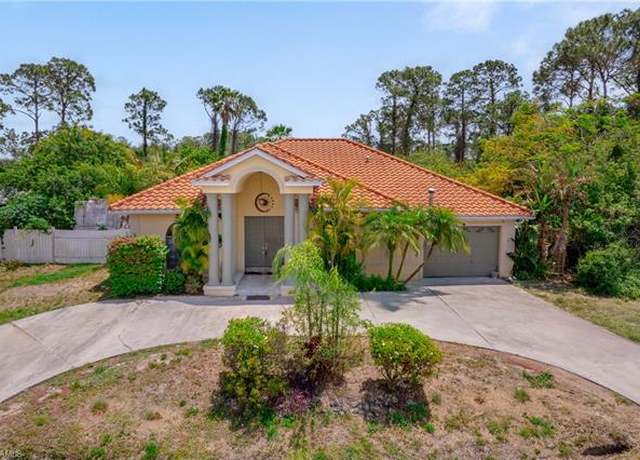 Property at 810 Mcarthur Ave, Lehigh Acres, FL 33936, 3 beds, 3.5 baths