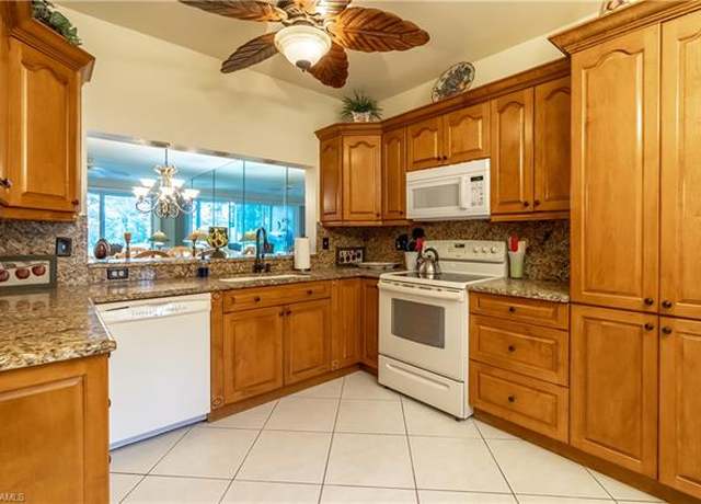Property at 725 Saratoga Cir Unit A103, Naples, FL 34104, 2 beds, 2 baths