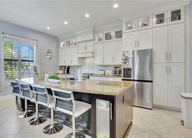 Property at 11591 Pin Oak Dr, Bonita Springs, FL 34135, 4 beds, 3 baths