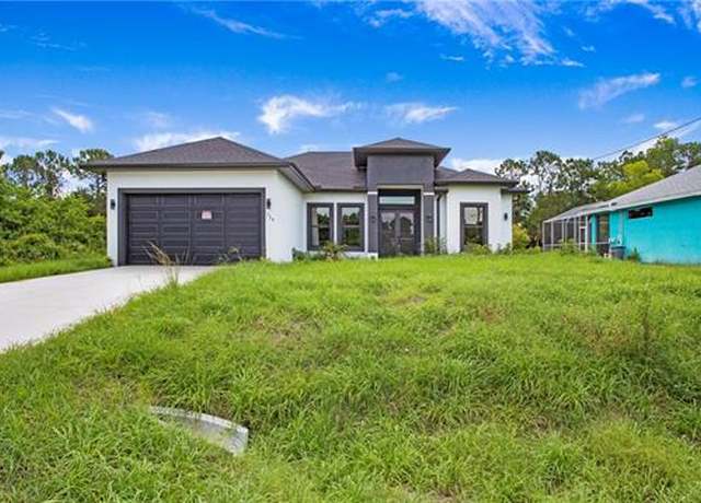 Property at 739 David Laird Ln, Lehigh Acres, FL 33974, 3 beds, 3 baths