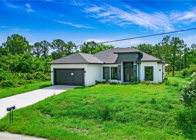 Property at 739 David Laird Ln, Lehigh Acres, FL 33974, 3 beds, 3 baths
