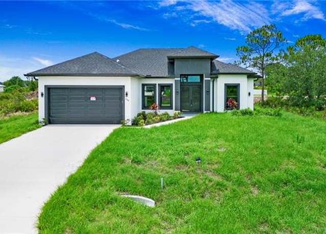 Property at 766 Naples Ave S, Lehigh Acres, FL 33974, 3 beds, 3 baths