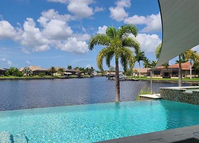 Property at 1000 NW 37th Pl, Cape Coral, FL 33993, 4 beds, 2 baths