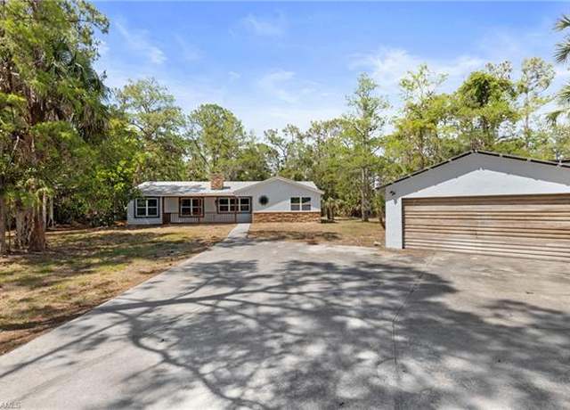 Property at 221 18th Ave NW, Naples, FL 34120, 4 beds, 3 baths
