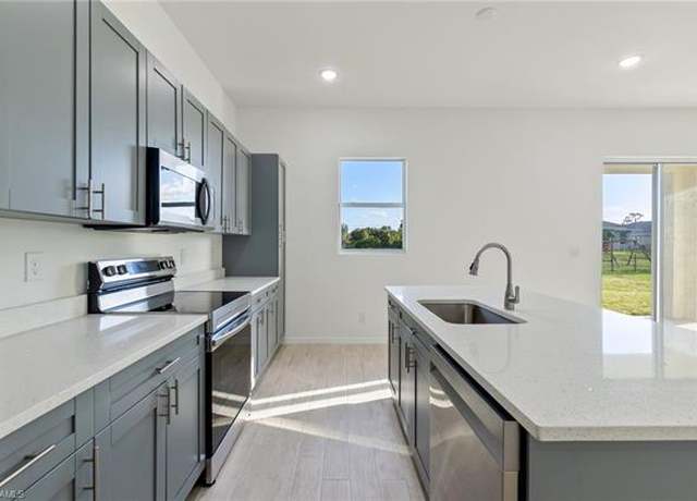 Property at 3413 39th St SW, Lehigh Acres, FL 33976, 4 beds, 2 baths