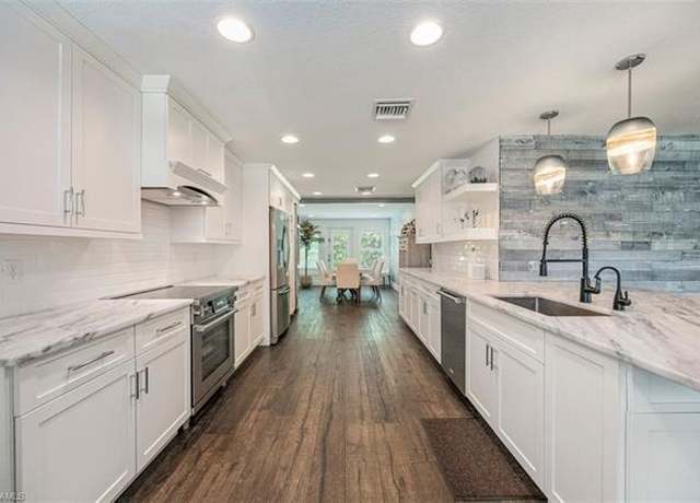 Property at 1129 8th Ter N, Naples, FL 34102, 4 beds, 3 baths