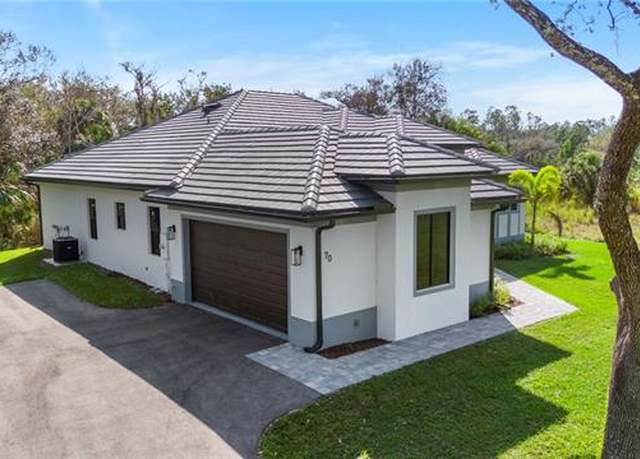 Property at 70 33rd Ave NW, Naples, FL 34120, 4 beds, 3 baths