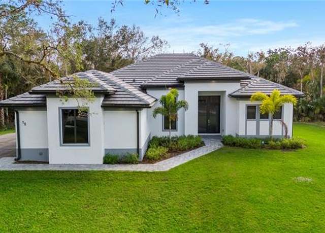 Property at 70 33rd Ave NW, Naples, FL 34120, 4 beds, 3 baths