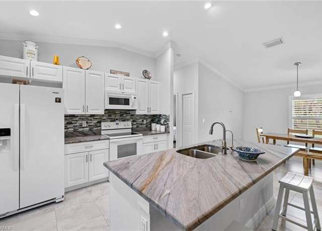 Property at 1187 16th Ave NE, Naples, FL 34120, 3 beds, 2 baths
